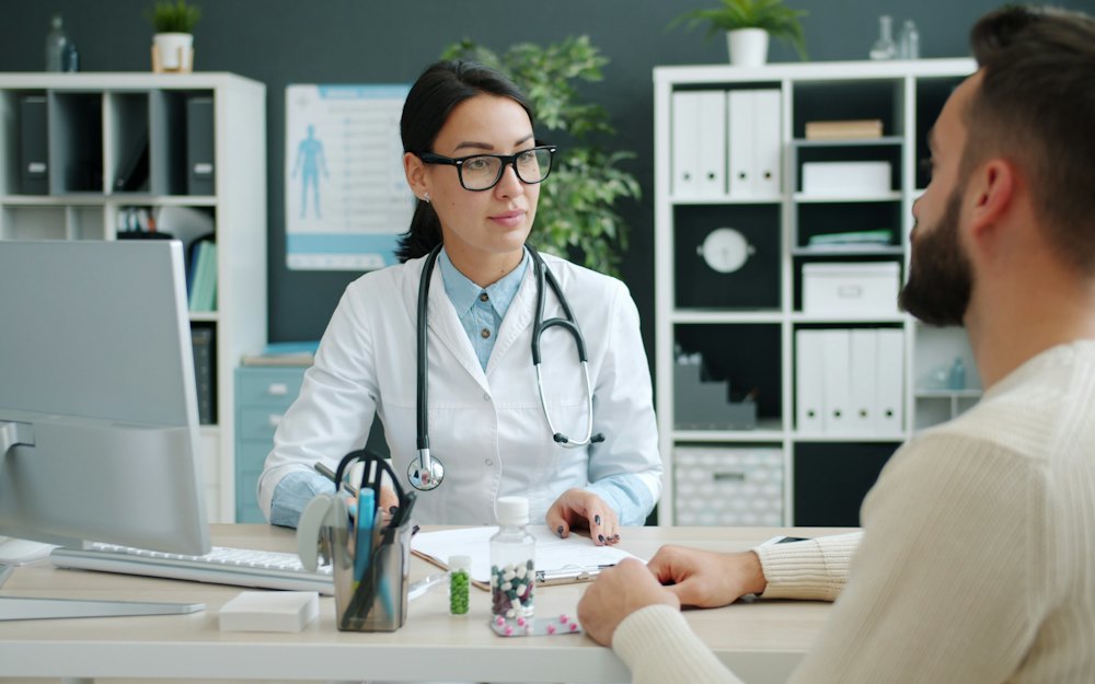 Doctor talking with a patient in a clinic